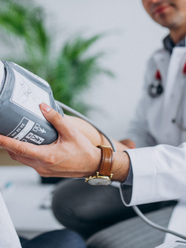 young-male-psysician-with-patient-measuring-blood-pressure (1)